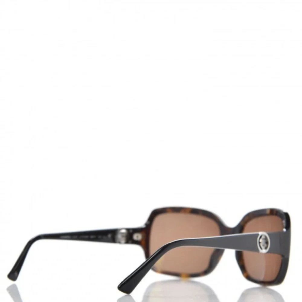 Chanel Rotating C's Sunglasses.